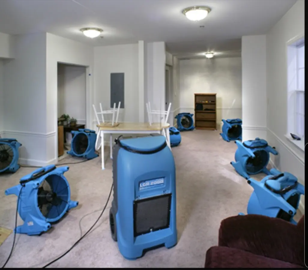 Air movers and dehumidifier setup for Water Damage Restoration in Highgrove